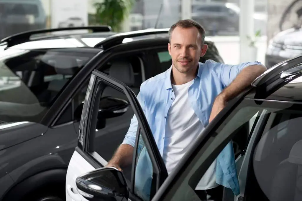 close up customer with business person car dealership